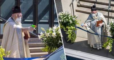 Being Creative With Social Distancing Rules, Detroit Priest Becomes Meme After He Uses Squirt Gun To Spray Holy Water On Churchgoers