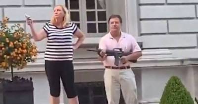 St.Louis Couple Who Pointed Guns At The Crowd Of Black Lives Matter Protestors On Their Lawn Are Under Investigation