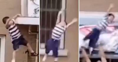 Astonishing Footage Shows Toddler Caught By Hero After Falling Five Storeys When He Climbed Out Of Window
