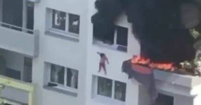 Two Kids Caught By The Crowd After Jumping From 40ft Burning Building