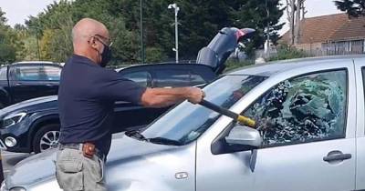 Man Saves Dog Left In Car In 34C Heatwave By Breaking Window With Axe