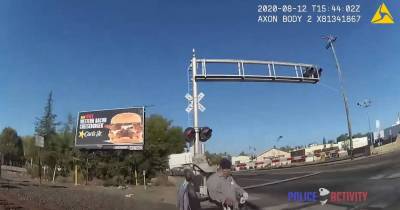 Dramatic Bodycam Footage Shows California Officer Saving Man Stuck On Train Tracks In Wheelchair