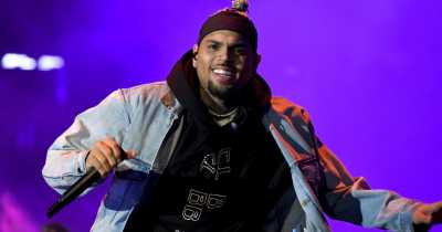 Chris Brown Assaulted A Woman By Knocking Her Weave Off