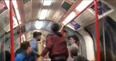 Bizarre Video Of Man Threatening Woman On Train Sparks Intense Debate