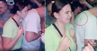 Woman Slammed For Kissing Unsuspecting Men's Shirts In Bar, Dubbed The 'Lipstick Bandit'
