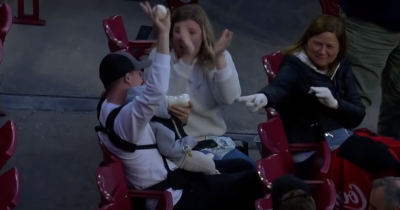 'Hero' Dad Catches Foul Ball While Feeding Baby At Padres-Reds Game