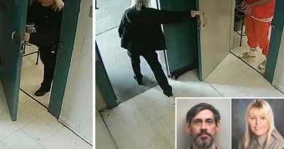 Bizarre Moment An Alabama Prison Guard Walks Out Of Jail With Her Inmate Lover Caught On Camera