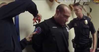Police Officer's Uniform Cut Off During Arrest For Domestic Violence