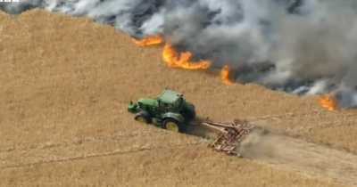 Farmer Heroically Ploughs Field To Stop Wildfire Spreading Through Crops Towards Houses