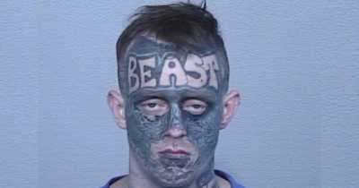 Man With Bizarre 'Beast' Tattoo On Forehead Being Hunted By Police