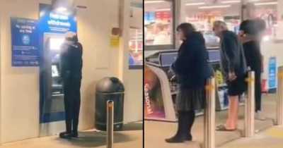 Man Set A Mannequin Outside Tesco Cashpoint Leaving Queue Of Frustrated People Waiting
