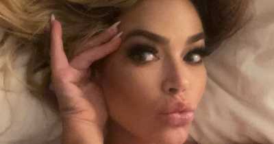 Denise Richards Sent Fans Wild In Skimpy Vest For Sultry Bed Snap