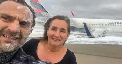 Couple Takes A Beaming Foam-Covered Selfie After Surviving Disastrous Plane Crash