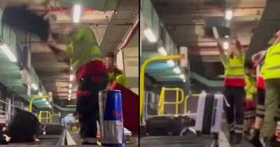 Baggage Handlers Caught Slamming And Through Luggage Onto Conveyer Belt