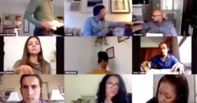 Co-workers Try To Warn Dude His Camera Is On As He Preps To Beat It