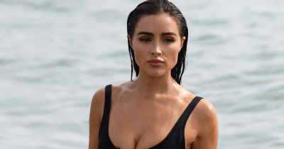 Olivia Culpo Stuns In Plunging Minidress By Snowy Christmas Trees