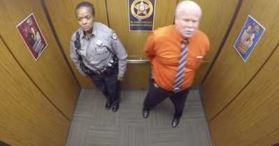Police Officer's Elevator Moment Goes Viral As He Is Unaware Of A Hidden Security Camera