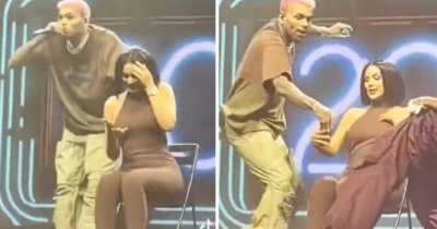 Chris Brown Angrily Throws Fan's Phone As She Wouldn't Get Off It After Being Invited On Stage