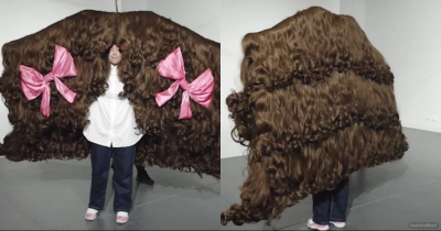 Woman Breaks Record For World&rsquo;s Widest Wig That Measures 8ft Across
