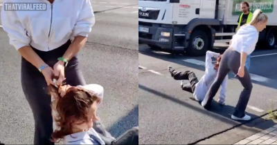 Woman Drags Climate Change Protestor By The Hair To Stop Her From Blocking Road