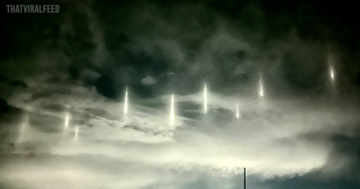 Nine Spectacular Light Pillars Illuminate the Night Sky in an 'Otherworldly' Display