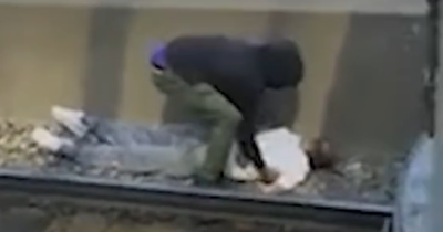 Hero Saves Man From Electrified Train Tracks In Daring Rescue