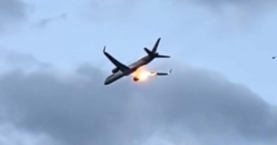 Terrifying Video Shows Flames Shooting From Plane's Engines As Passengers Say They Sent 'Goodbye Texts'