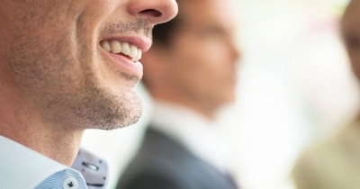 The Real Meaning Behind The 'Hung Smile' &mdash; And Why People Think It Reveals A Man's Size