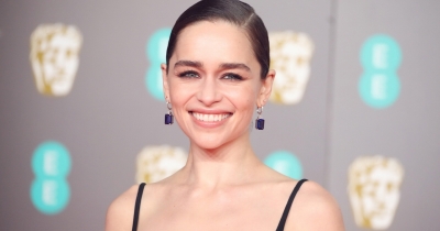 Emilia Clarke Says She 'Broke A Rib' Filming An NSFW Scene With Three Men For Her New Show